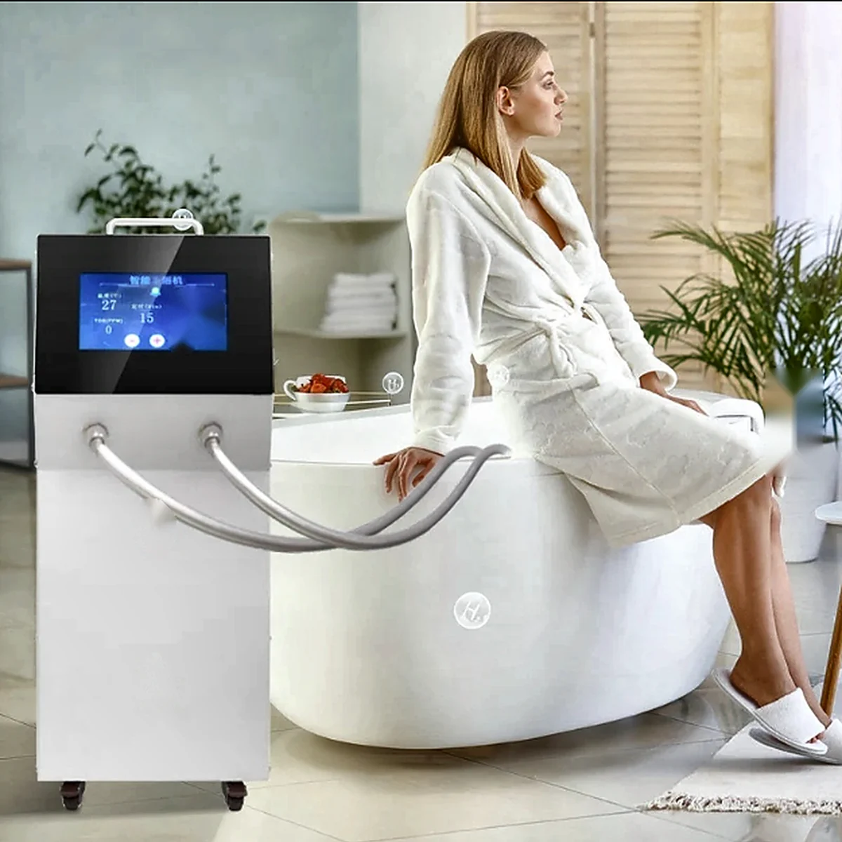 Hydrogen bath therapy: the VIM bath system beside a freestanding tub